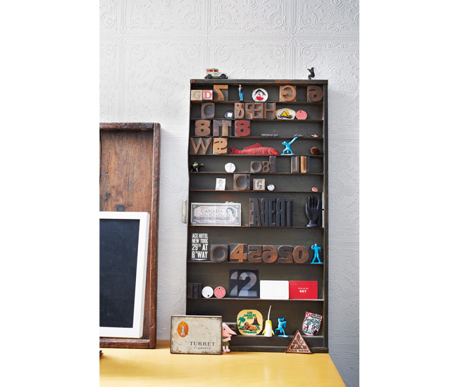 A type drawer holds letterpress blocks and mini memorabilia.