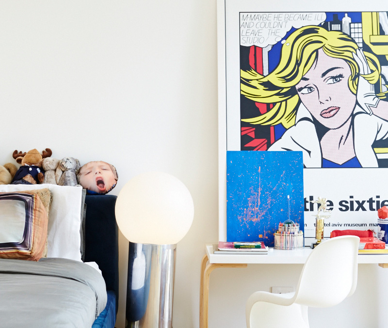 Indie’s bedroom is kitted out with a Roy Lichtenstein print, floor lamp by Artemide, bed from Kiosk, and chair from Design Within Reach. Photo by Naomi Finlay.