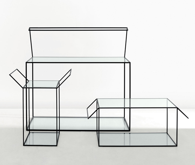 The Gardo° collection for Molteni & C includes glass tables that look like boxes with lids that have sprung open.