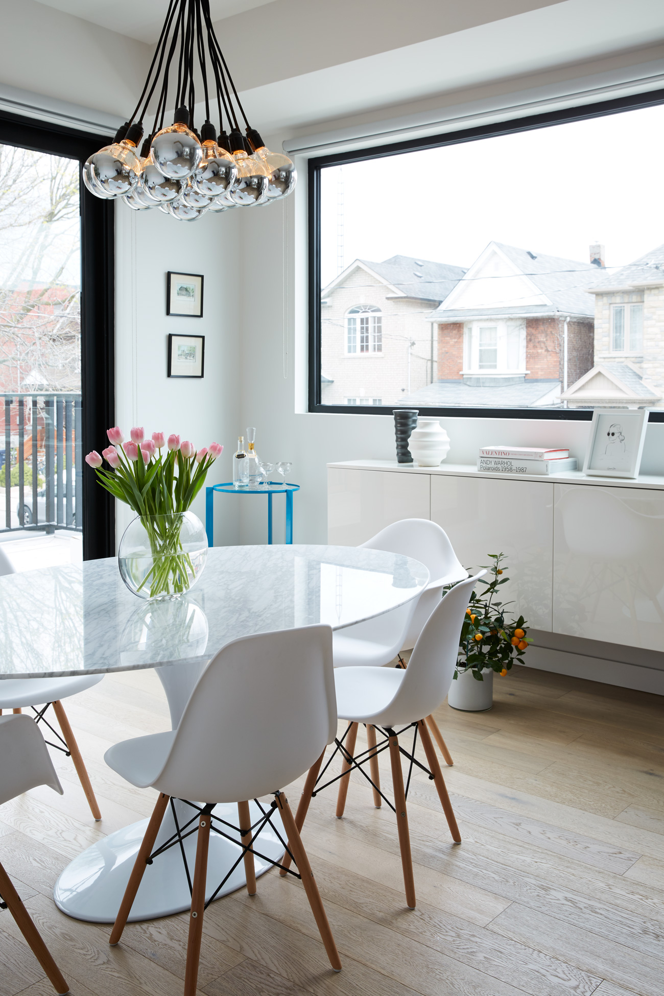 Furniture in the dining room – with north-facing balcony – is from Rove Concepts (Vancouver). Photo by Naomi Finlay.