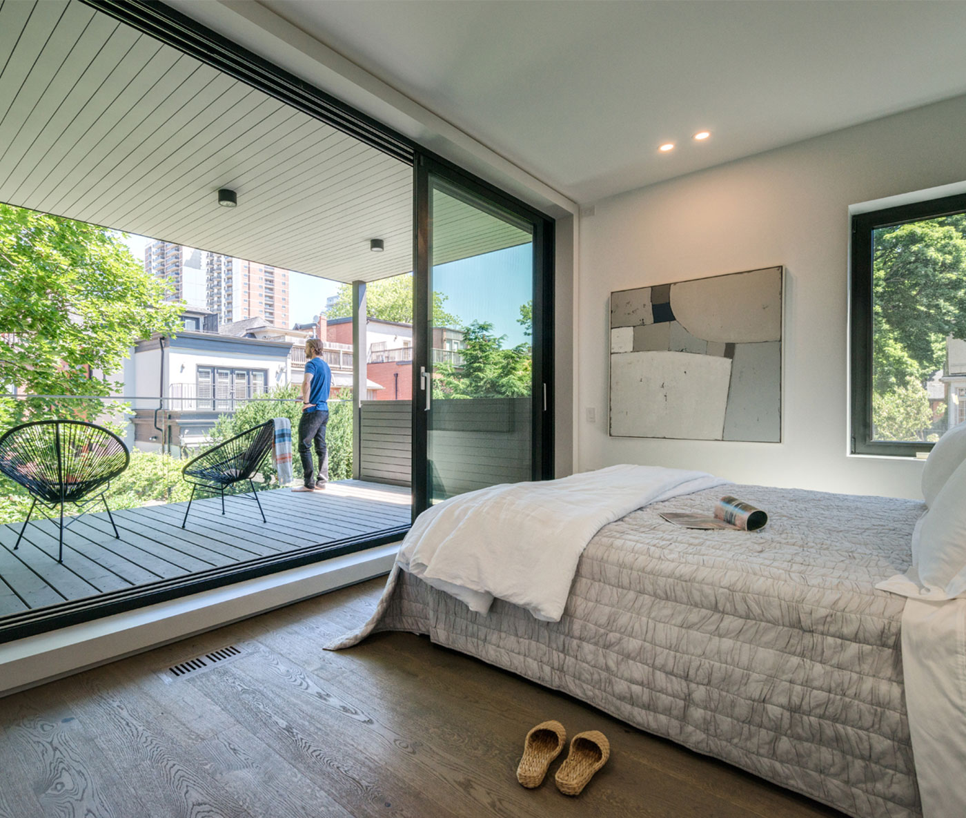 Master Bedroom walks out to a balcony. Annex Victorian reno by 3Gen development