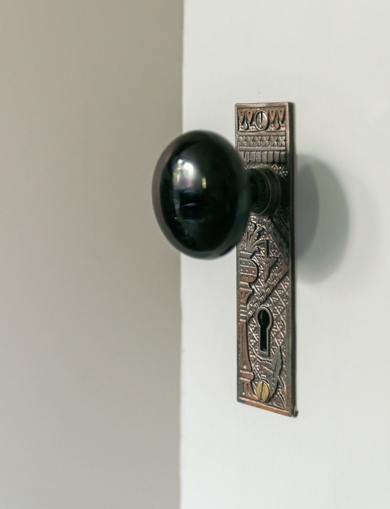 Every William Morris-style grate, hinge and mortise lock was restored.