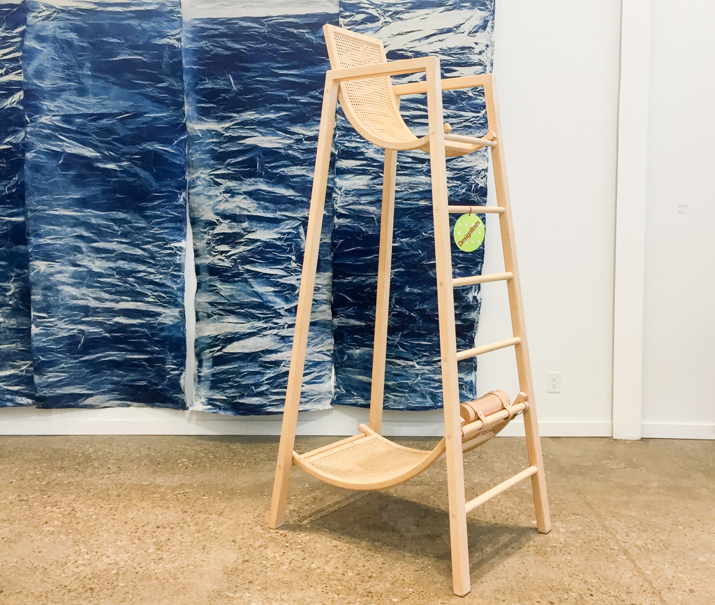 Louie George Michael’s towering maple two-seater, fuses rattan lounge chairs with a lifeguard stand. While cheeky – the exhibition text reveals the design is dedicated 