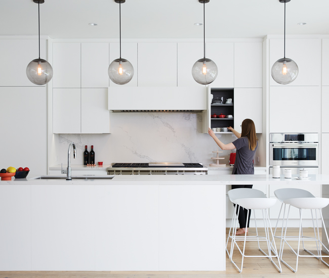 White kitchen by Sixteen Degree Studio