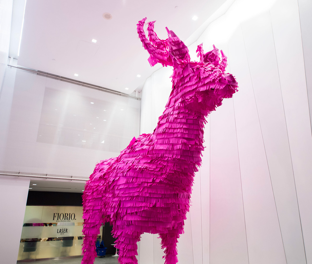 Entitled #ohdeer, global architecture, design, and planning firm, Gensler, deposited a hot pink two-storey tall paper buck in the lobby of a condominium.  A nod to the hooved animals that used to grace and graze the now highly populated area, the piece is in fact a piñata whose contents will spill this weekend. (2 St. Clair Avenue W.)