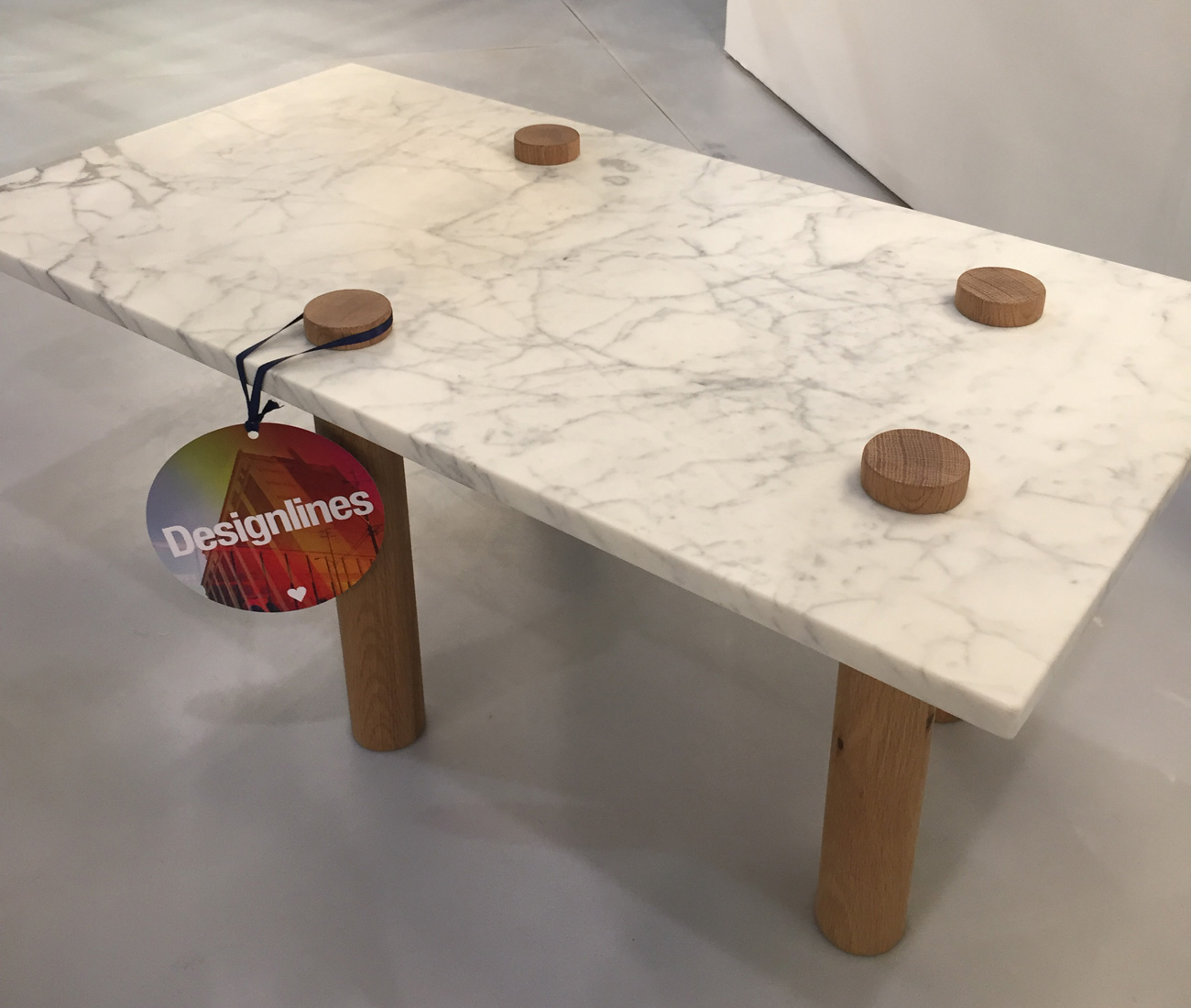Polar Bear by Hollis + Morris. Bear with him: Just released by Hollis + Morris, the Toronto design studio headed by Mischa Couvrette, this playful marble-top coffee table with cylindrical wooden legs is meant to evoke a polar bear.