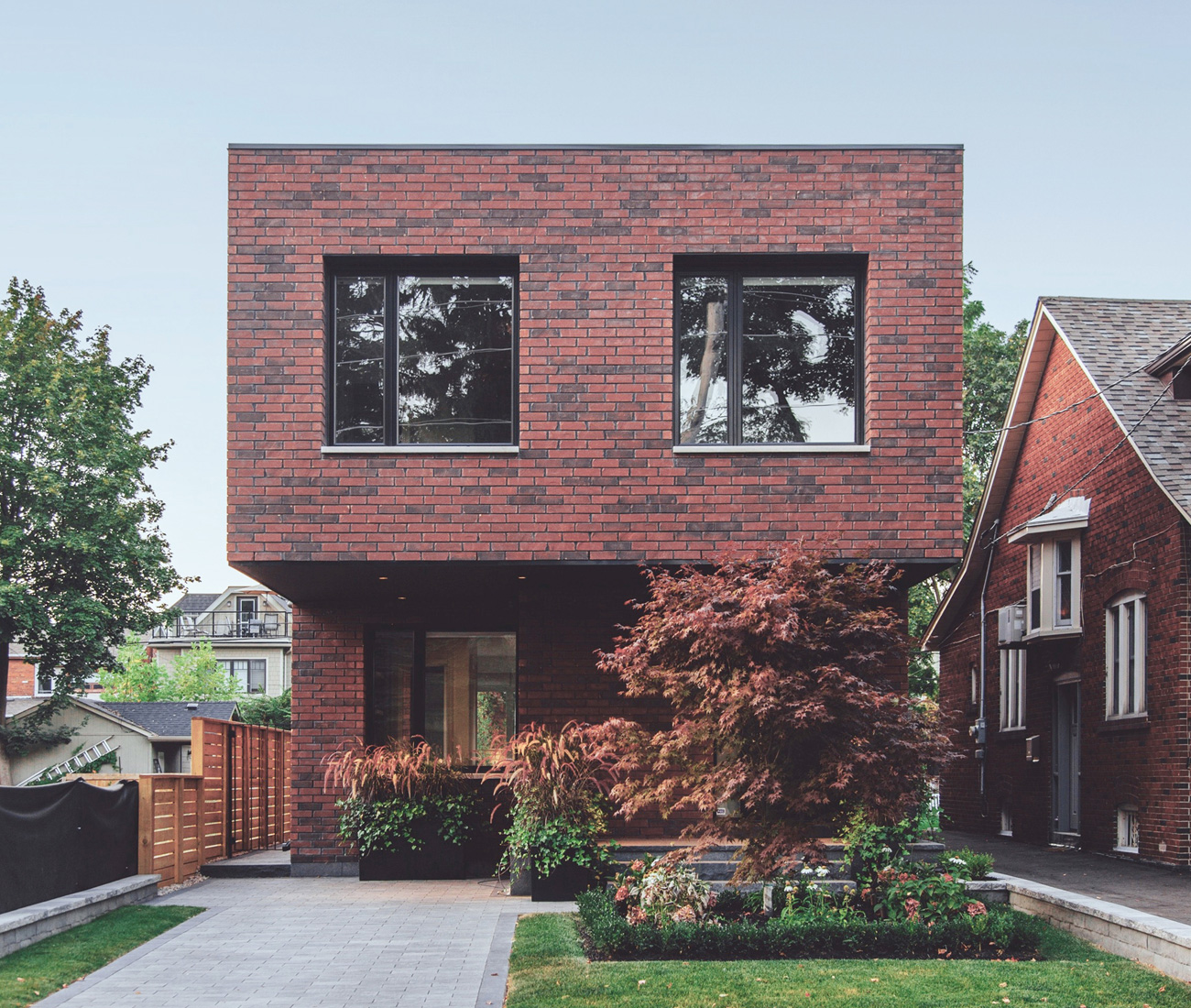 Gabriel Fain Architects Brick Cantilever Home Toronto