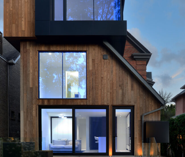 Modern house design with wood exterior cladding and big windows - Yorkville Design Centre - Thomas Tampold