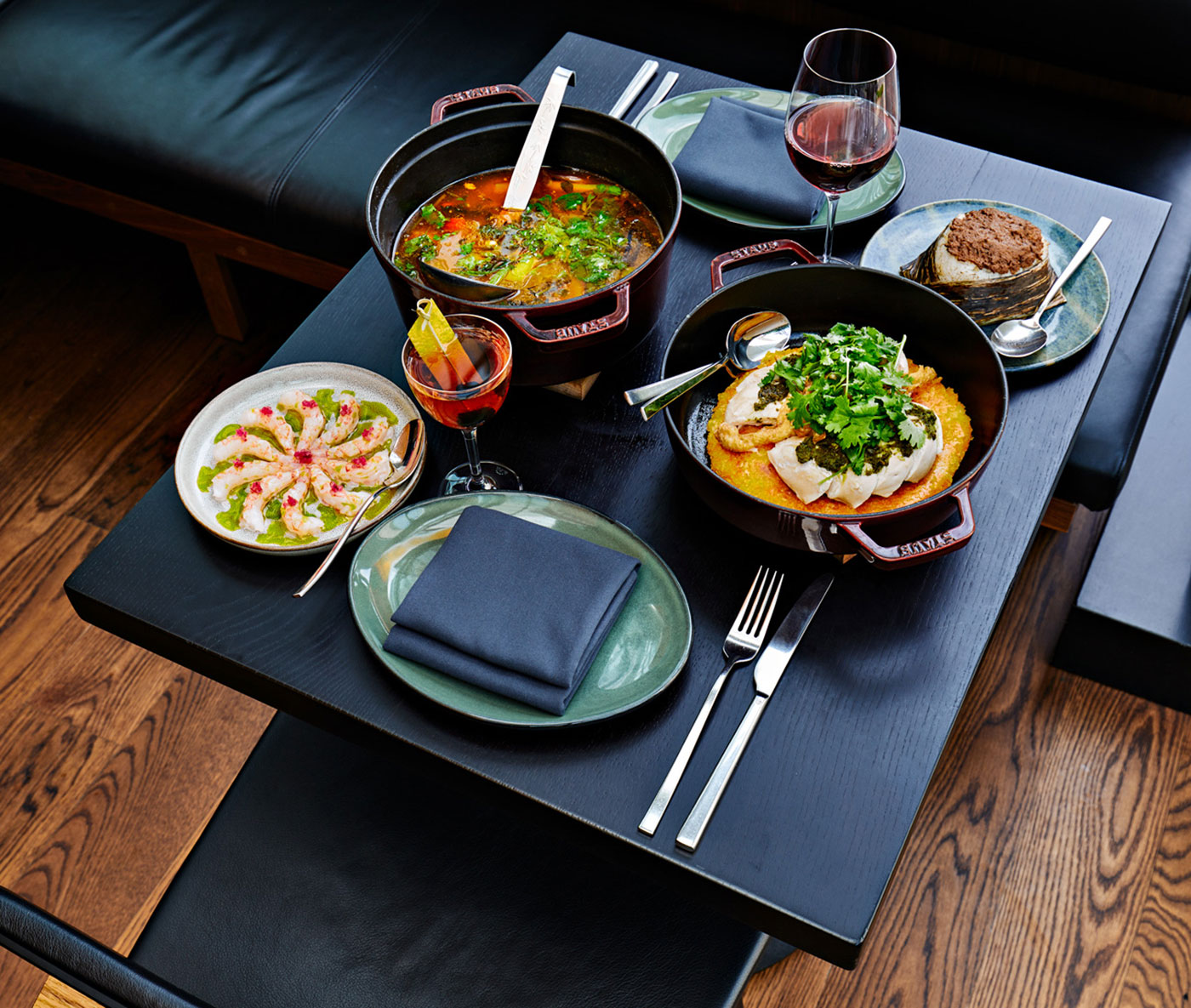 A table filled with yummy food at Kōjin restaurant in Toronto