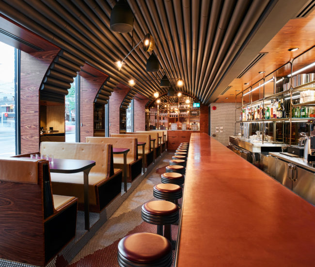 Bar counter at Aloette restaurant in Toronto, design by Commute Design