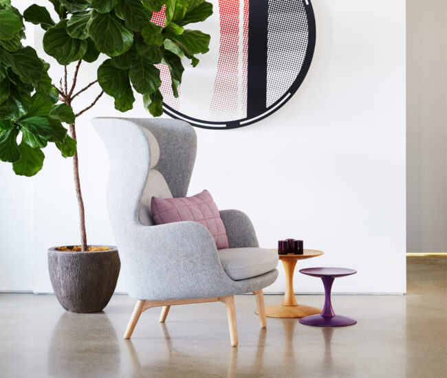 Danish design, Living space with armchair and large plant at Torp
