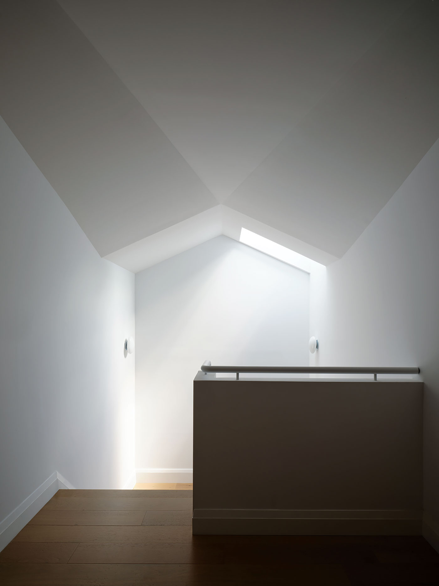 A skylight breathes life into a Deer Park home.   Photography by doublespace photography. 