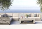 Couch set with a lake in background from Insideout patio furniture store