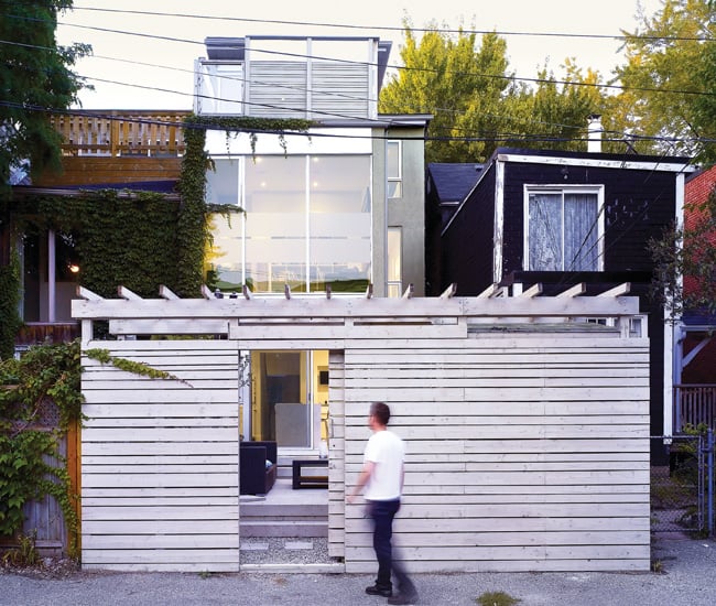 Like most row houses in Cabbagetown, the backyard faces onto a laneway. Dubbeldam frosted portions of the low-e glazed cladding to maximize light and heat without giving up privacy.