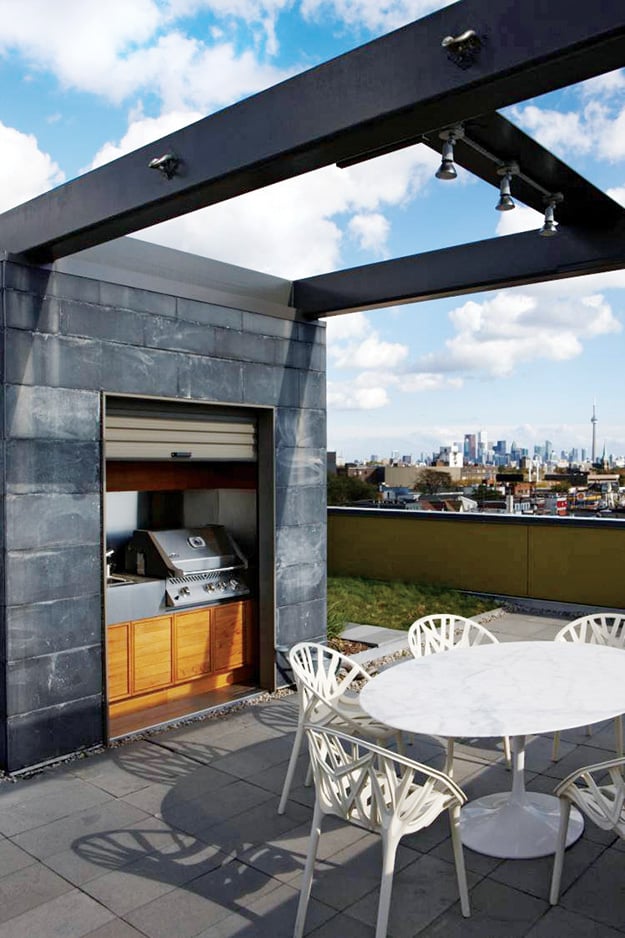 rooftop, limestone and Douglas fir define the kitchen, which has uninterrupted views of the Toronto’s downtown.