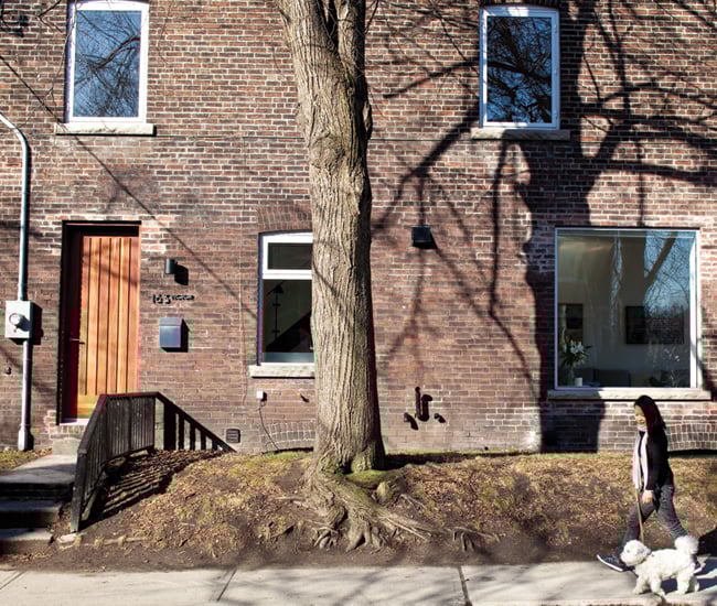 Toronto home’s original brick is complemented by an exterior door by Madawaska Doors.