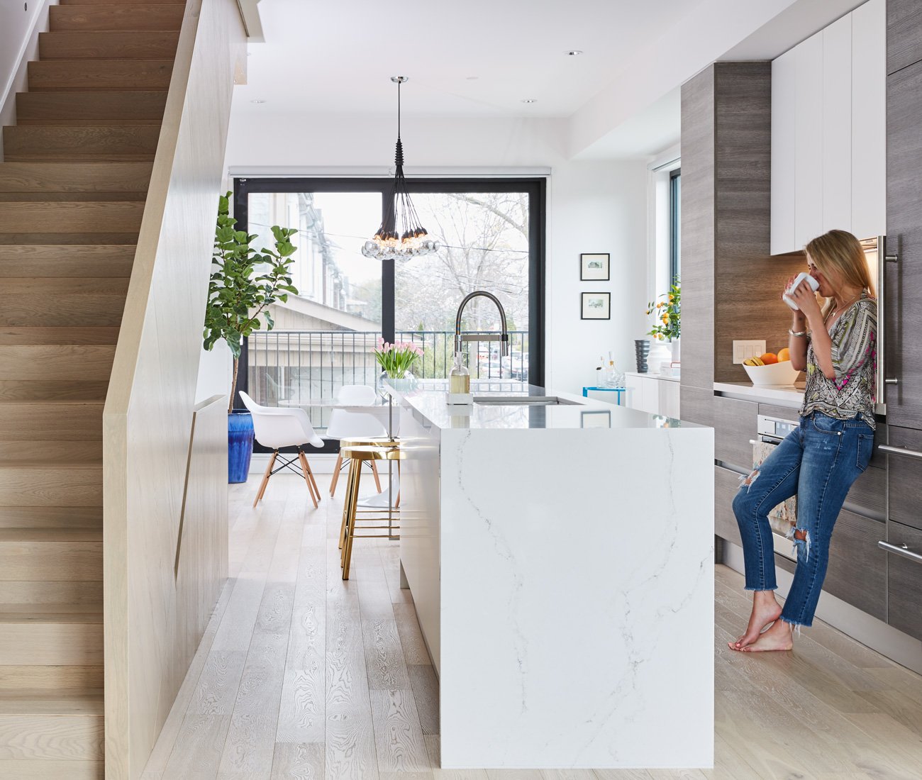 PR professional Kate Makinson enjoys a coffee at her Harbord Townhouses designed by Superkül.