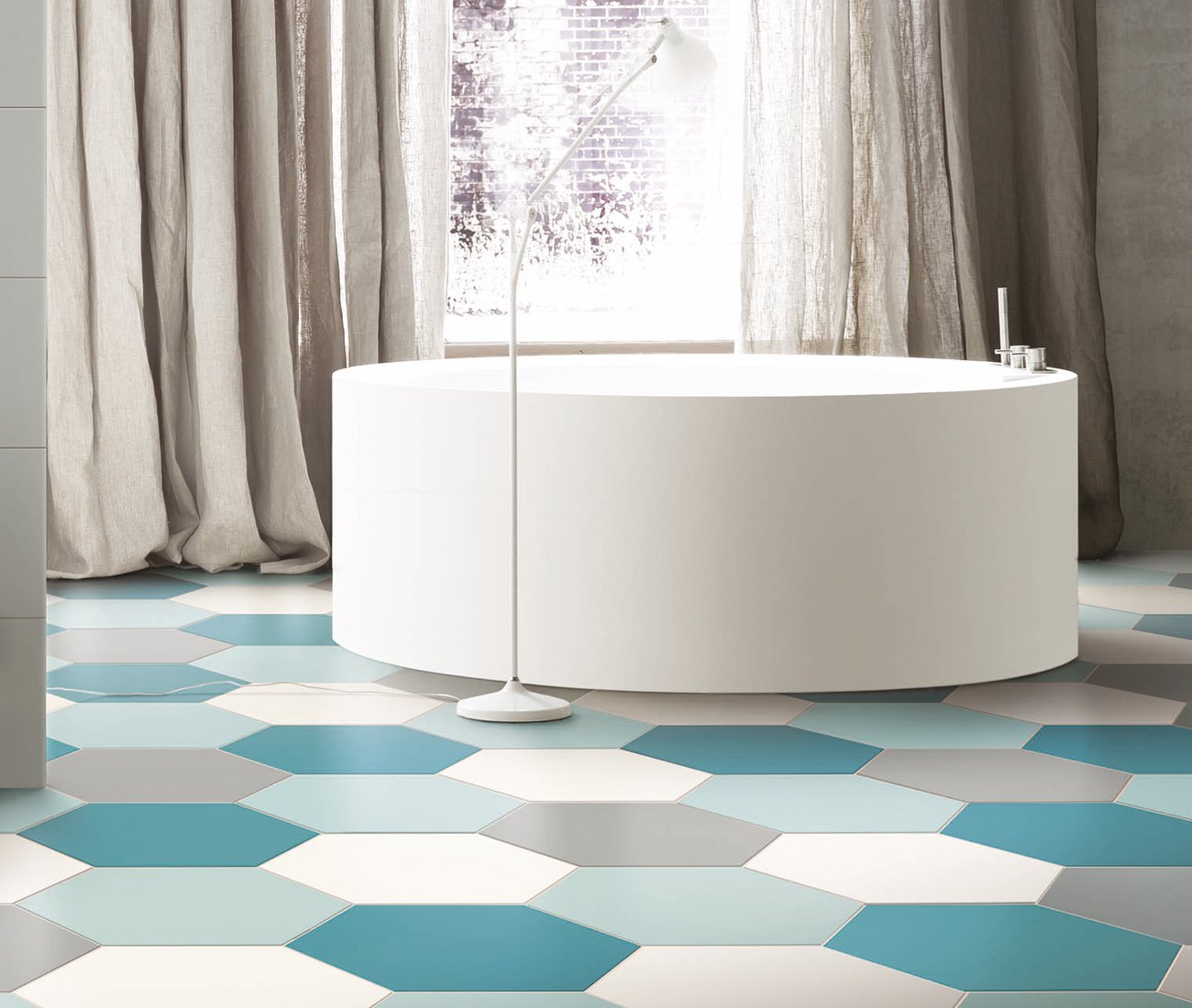 hexagon-shaped ceramic tiles by Tagina - bright bathroom design