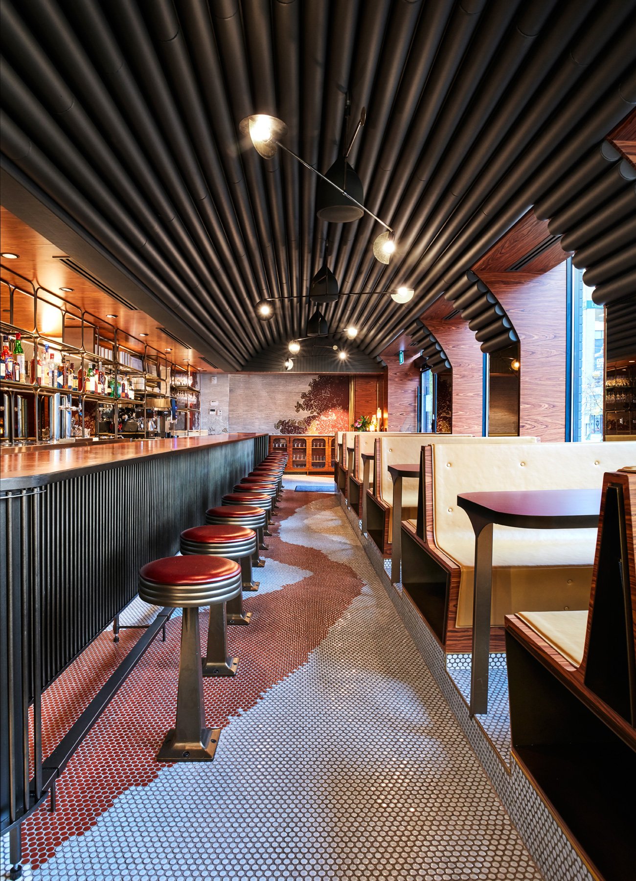 Interior of Aloette restaurant in Toronto, design by Commute Design, bar stools and booth seating