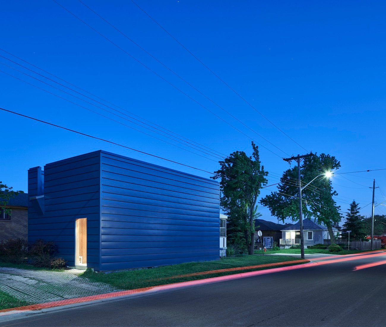 traditional homes modern additions, wrapped in zinc panels 