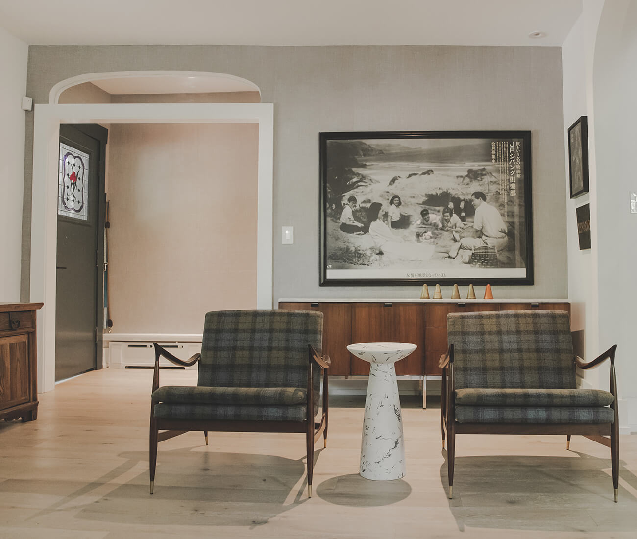 Deborah Moss's living room features a poster for a film by Japanese director Yasujirō Ozu.