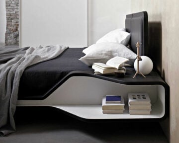 Books on a night stand integrated into the frame