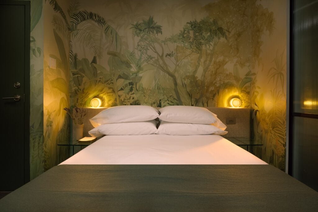 Bed with graphic art on the wall