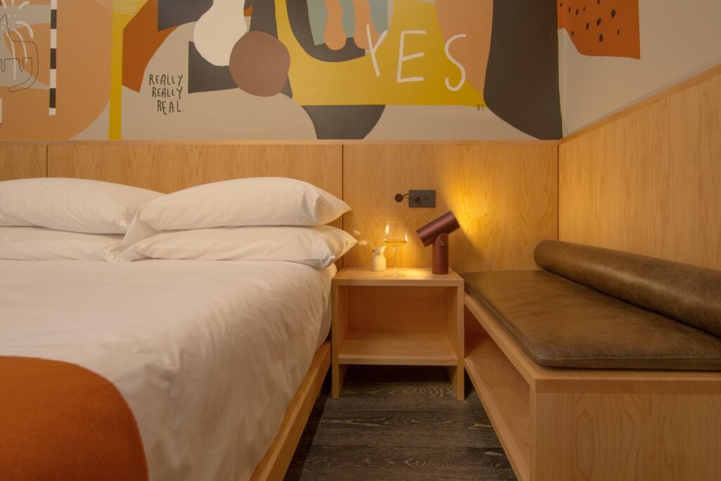 Bedroom design with art on the wall