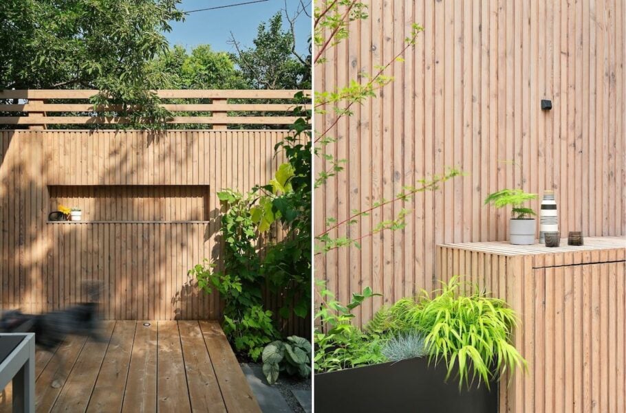 Wood slat walls of eastern white cedar provide a modern backdrop in a backyard