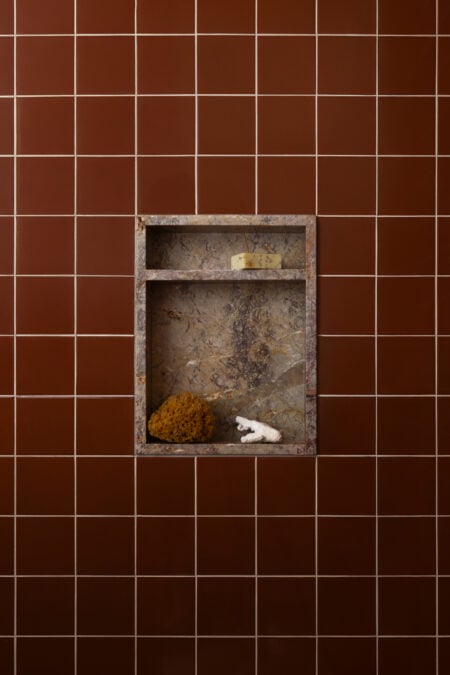 bathroom red square tile in shower