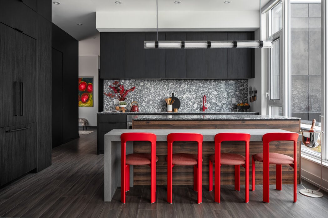 pop of red in black kitchen - Toronto penthouse design